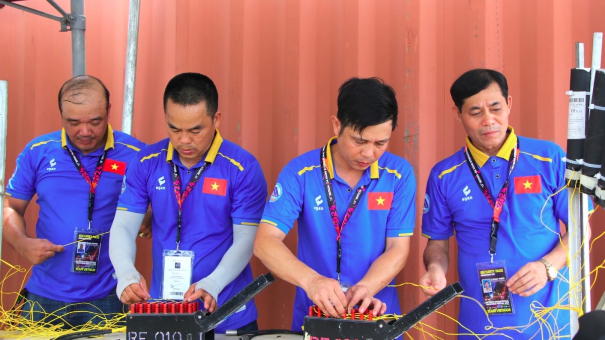 Members of the Vietnamese team make preparations for their show at the opening ceremony due to take place on June 8.