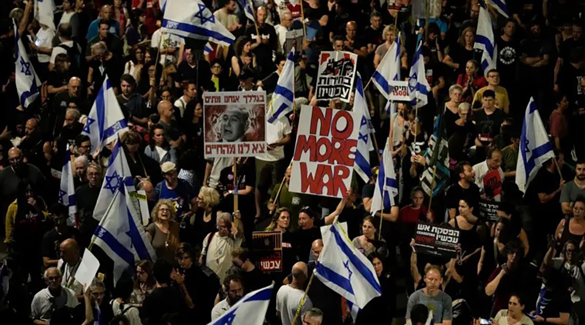 Người Israel biểu tình phản đối chính phủ của Thủ tướng Benjamin Netanyahu. (Ảnh: AP)