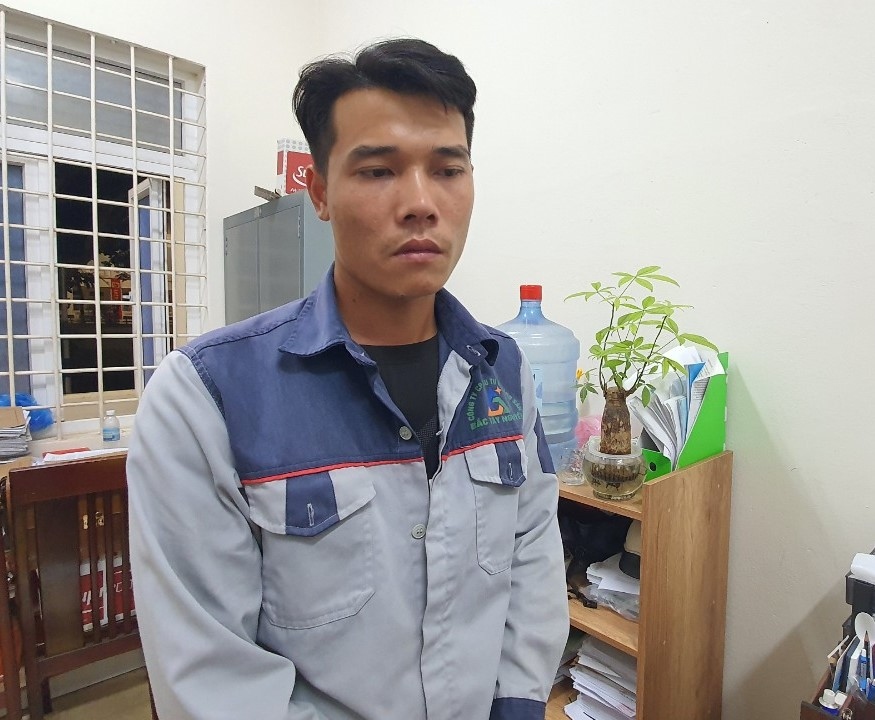 Đồng Hữu Long tại cơ quan công an.