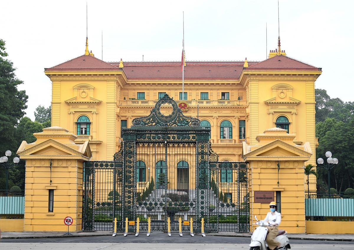 The flag is hosted at half-mast at the Presidential Palace in Hanoi.