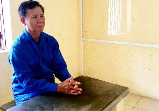 Ông Trần Đức Hùng tại cơ quan công an