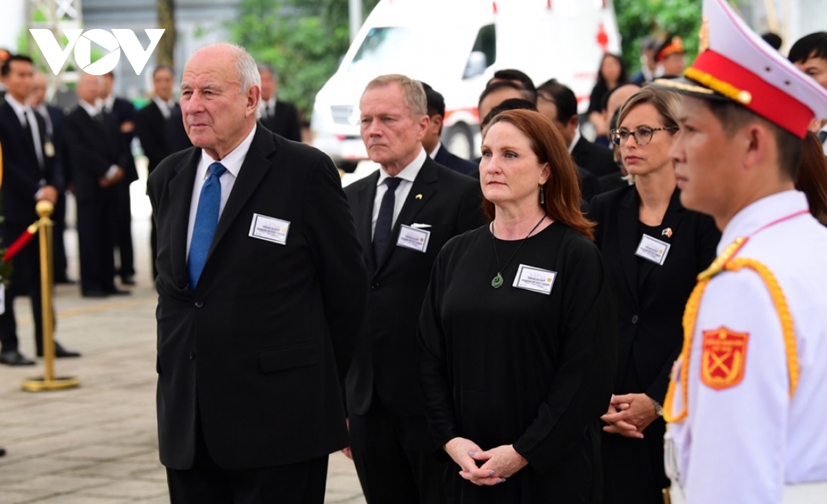 A delegation of the New Zealand government is led by special envoy Donald Charles McKinnon (first from left)