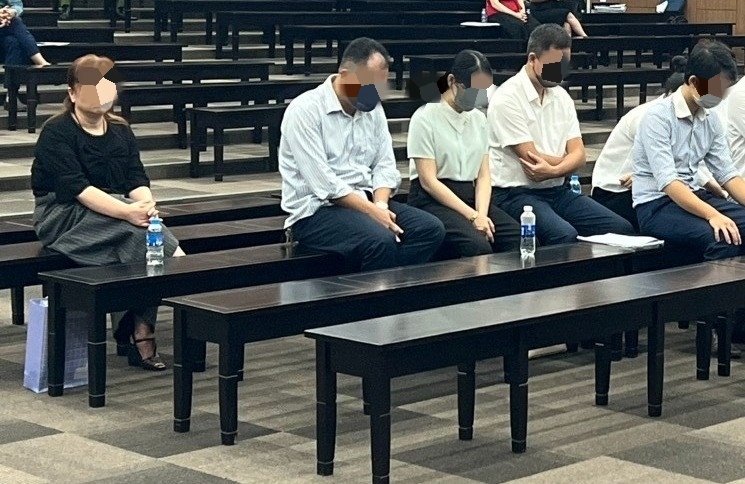 Các bị cáo tại phiên tòa ngày 9/8
