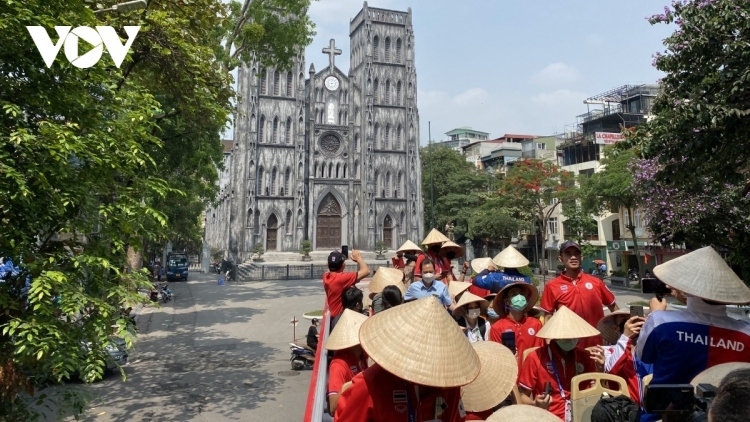 Tourists visit St. Joseph's Cathedral (Nha Tho Lon) in Hanoi 