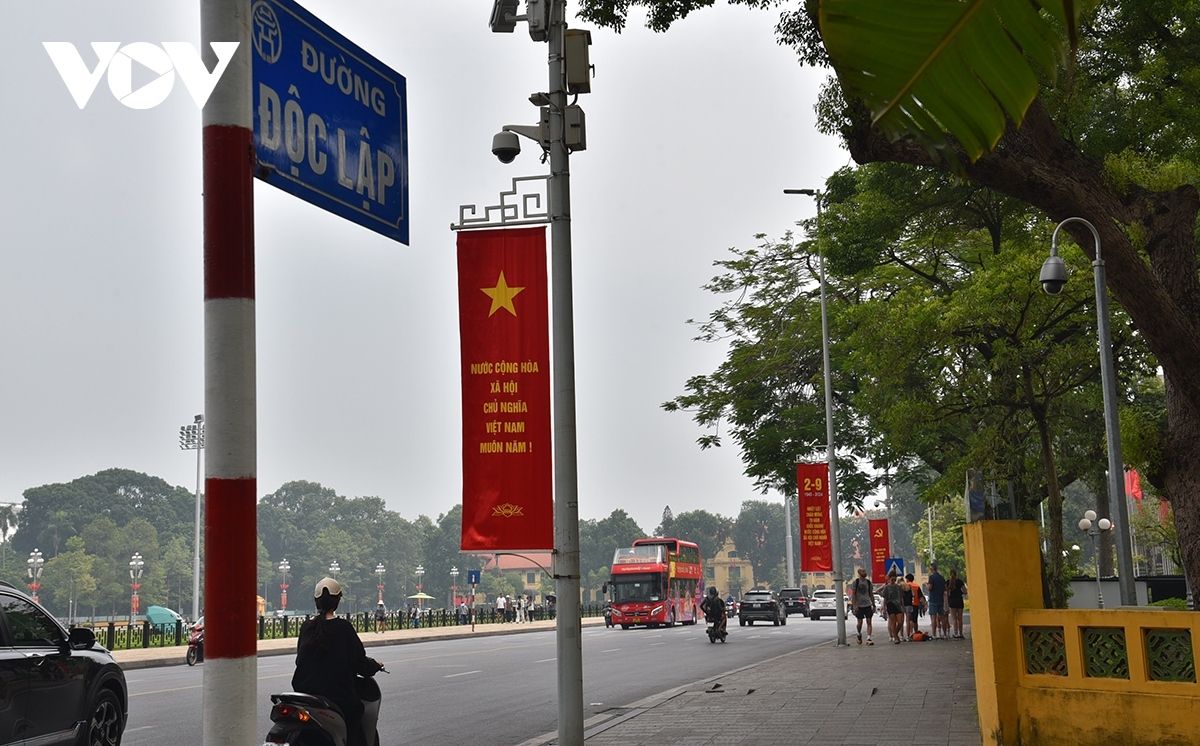 Posters and panels bearing messages praising National Day are put on display on Doc Lap road.