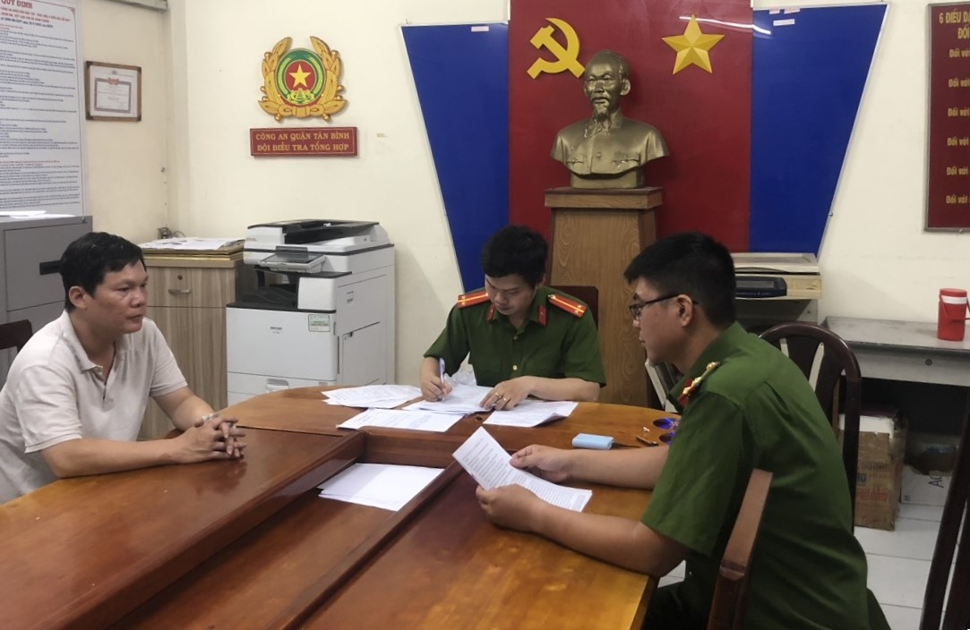 Ông Nguyễn Minh Đức tại cơ quan công an. (Ảnh: CACC)