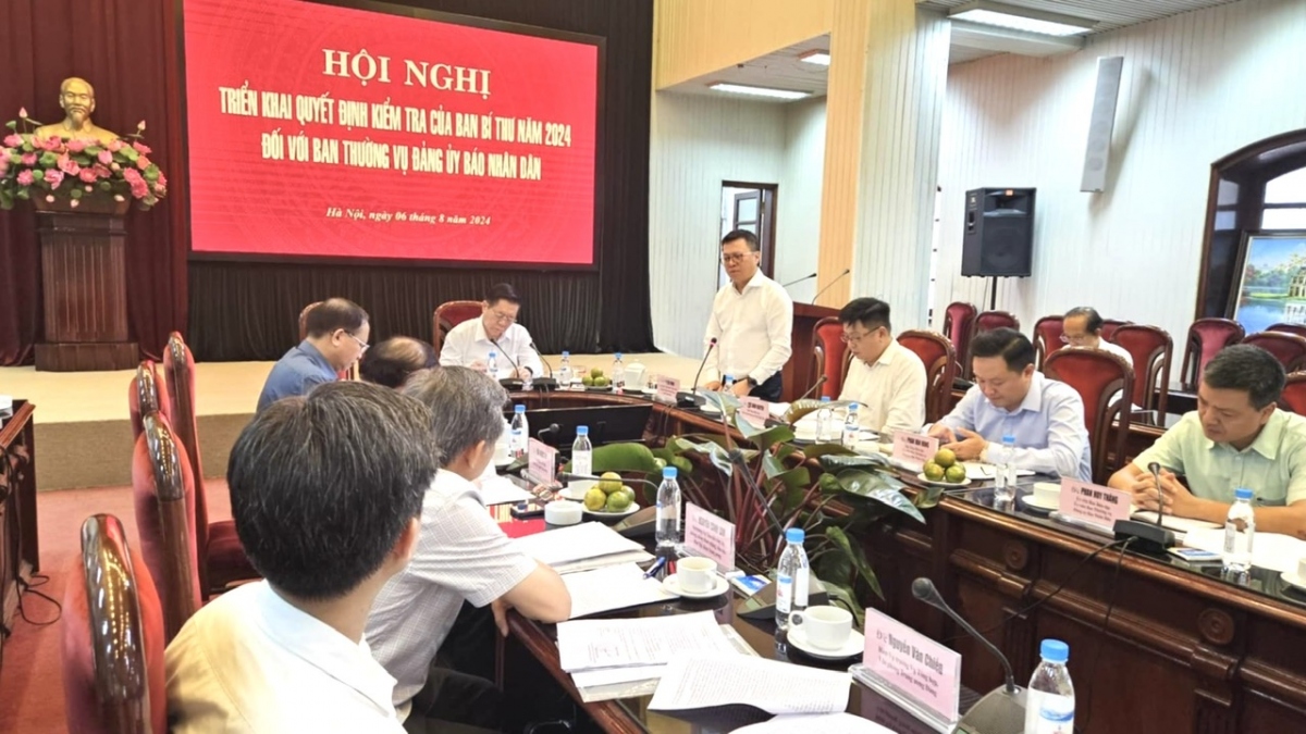 Tổng Biên tập Báo Nhân dân Lê Quốc Minh phát biểu tại Hội nghị