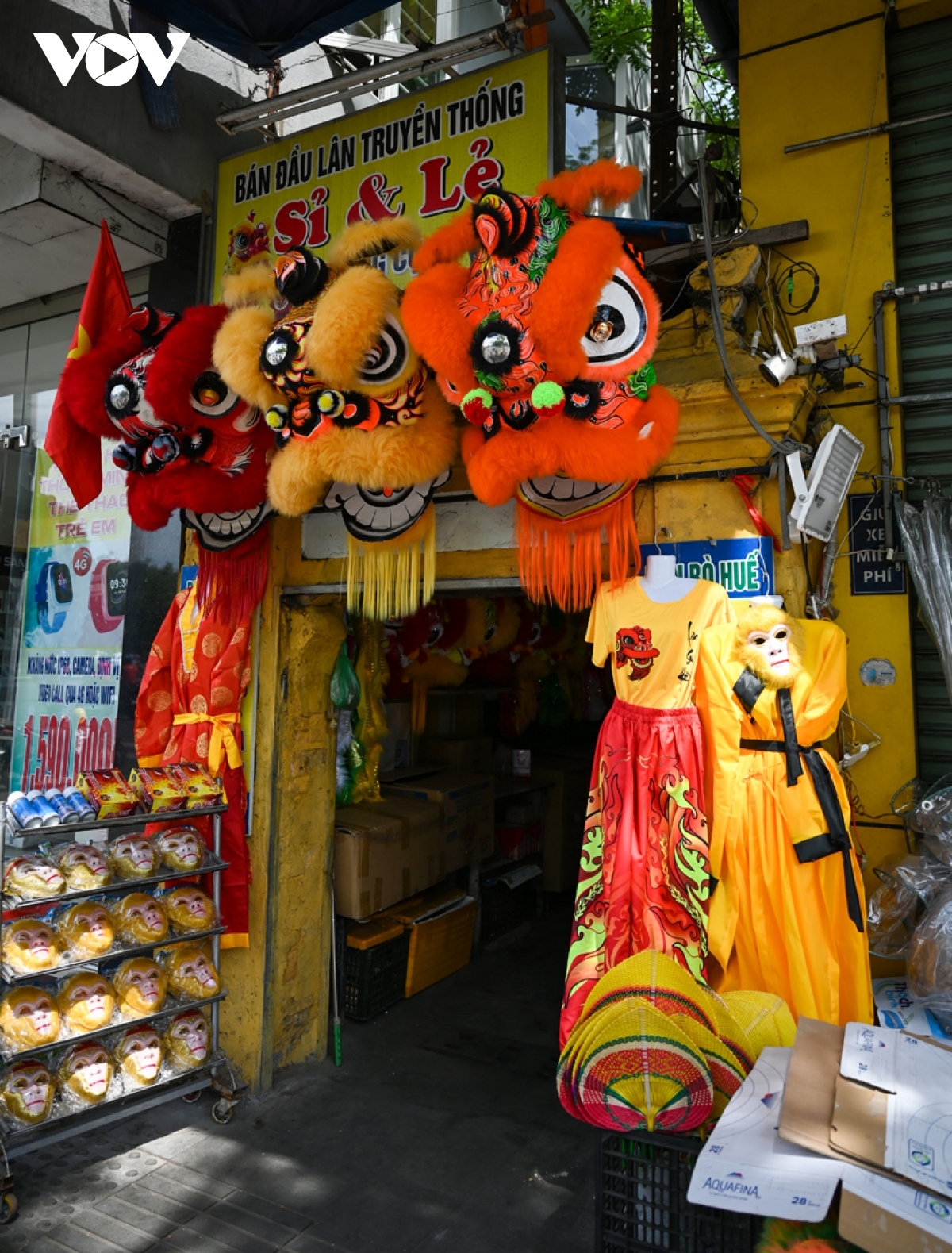 Tran Hung Dao street, dubbed the largest toy market in Hue, is coloured by long rows of lion heads hanging along it for sales.