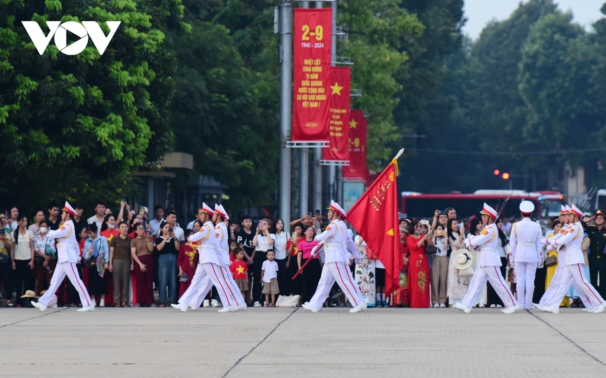 At 5:55 a.m., soldiers from the Command of Protection for the Ho Chi Minh Mausoleum get the event underway at the historic Ba Dinh Square located in Hanoi.