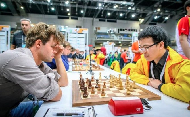 Le Quang Liem is defeated by World No.1 Magnus Carlsen in the eighth round of the 2024 Chess Olympiad
