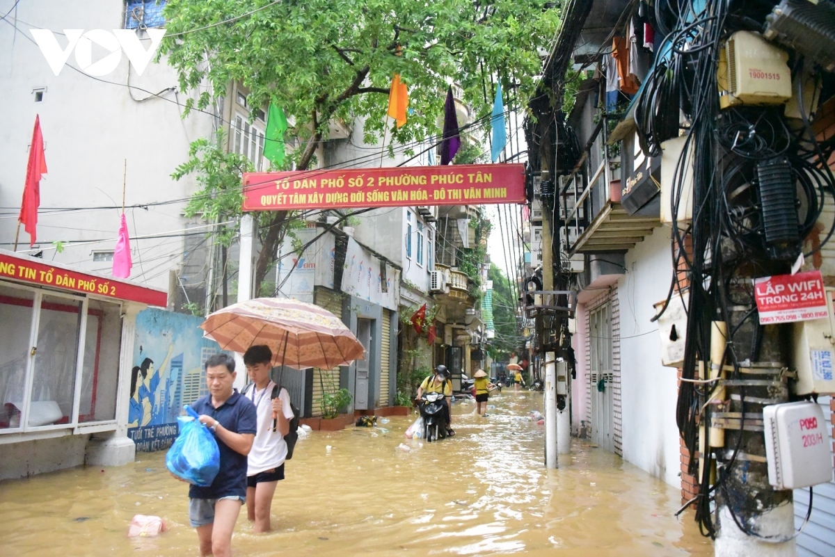 Floodwaters from the Red river have inundated residential areas in Phuc Xa ward of Ba Dinh district, near the base of Long Bien bridge due to the impact of typhoon Yagi which is the most powerful storm in Asia this year and the strongest to hit Vietnam over the past three decades.