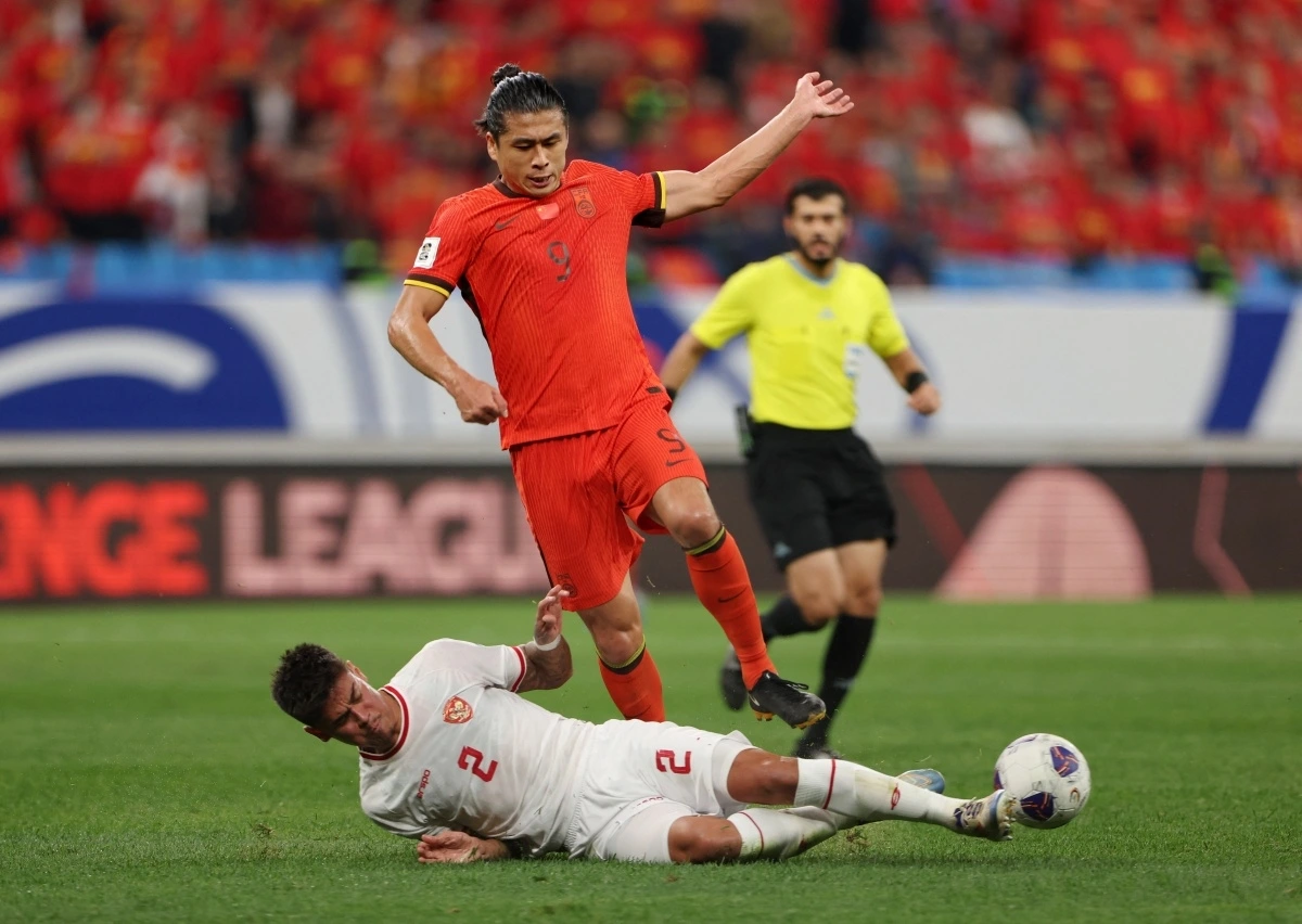 Trung Quốc hạ gục Indonesia (Ảnh: Reuters).