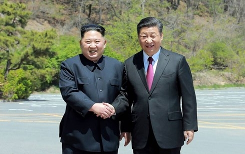 Nhà lãnh đạo Triều Tiên Kim Jong-un và Chủ tịch Trung Quốc Tập Cận Bình. Ảnh: Reuters