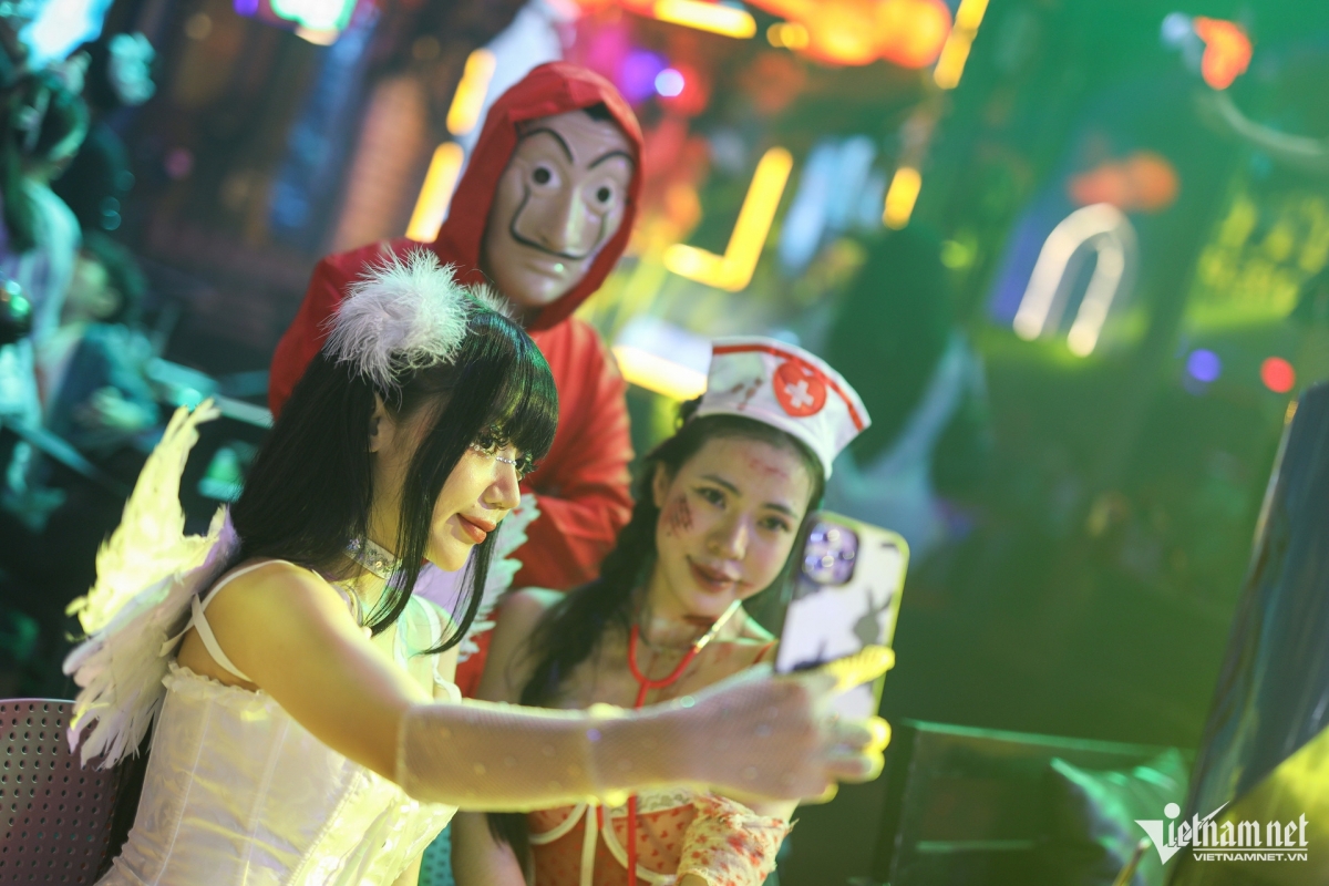 Young people immerse themselves amid the festive atmosphere.