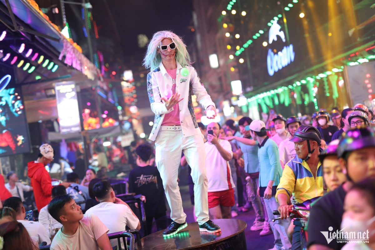 Tourists also join in the Halloween atmosphere.