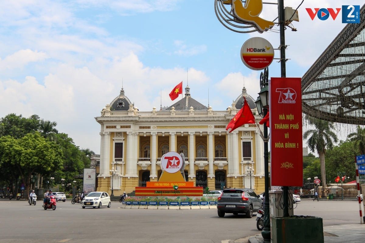Plenty of national flags, banners, and slogans adorn Trang Tien street leading towards August Revolution Square in Hoan Kiem district in the heart of the capital.