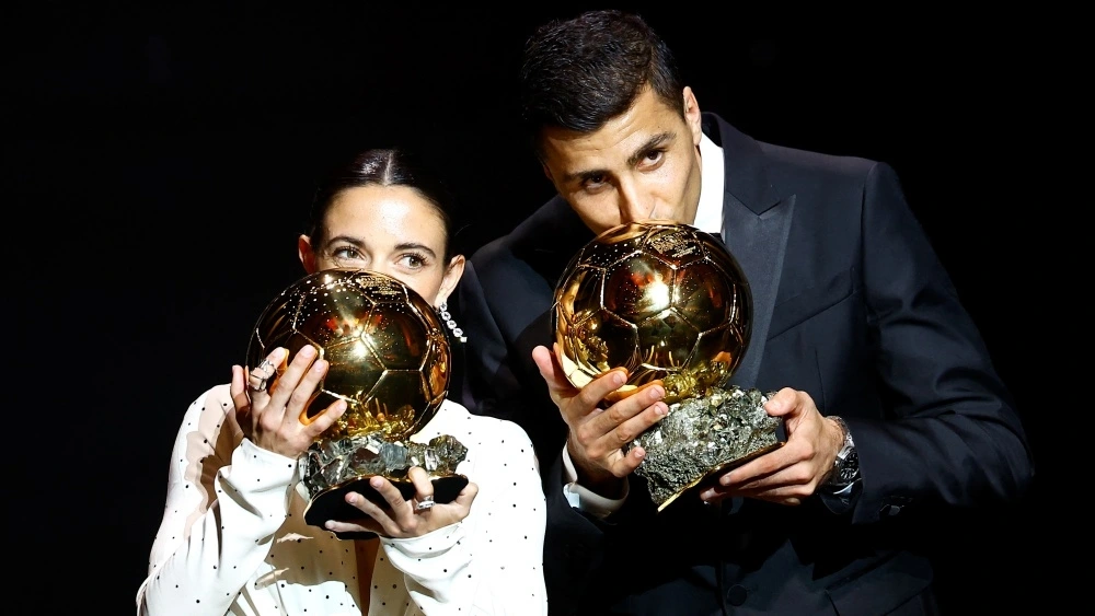 Rodri và Aitana Bonmatí giành Quả bóng Vàng 2024 (Ảnh: Reuters).