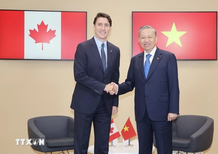 Tổng Bí thư, Chủ tịch nước Tô Lâm và Thủ tướng Canada Justin Trudeau (Ảnh: TTXVN)
