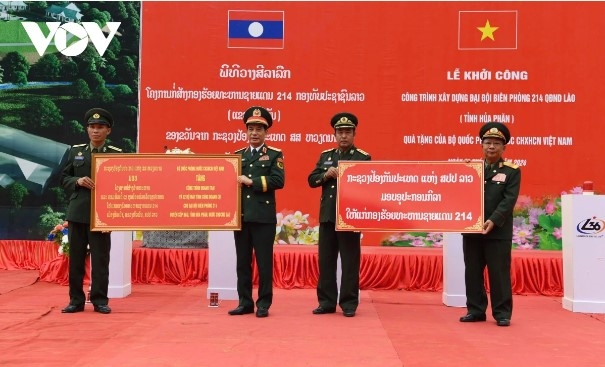 The two delegations attend the groundbreaking ceremony for the 214th Border Guard Company barracks, a gift from the Vietnam People's Army.