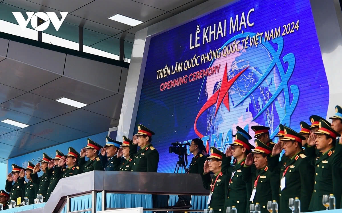Delegates render the flag salute during the final rehearsal for the exhibition.