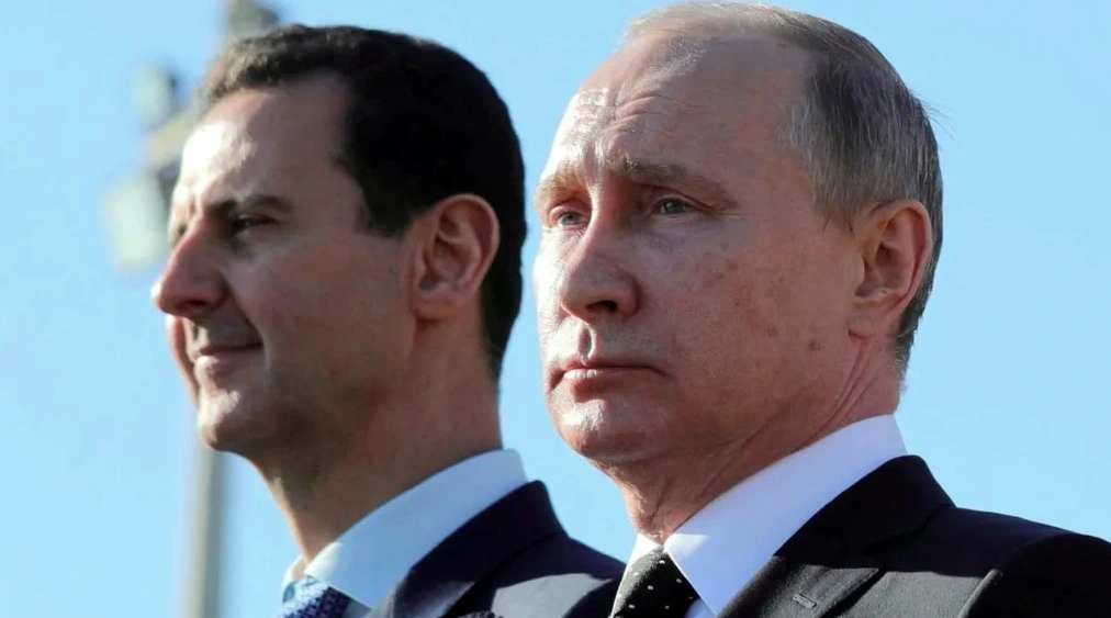 Tổng thống Nga Vladimir Putin và ông Assad. Ảnh: Reuters