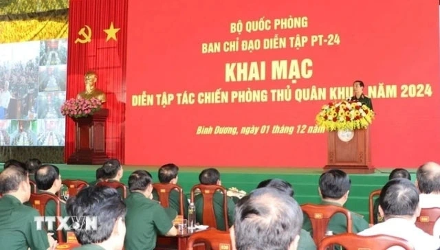 Toàn cảnh buổi khai mạc diễn tập tác chiến phòng thủ Quân khu 7 năm 2024 (Ảnh: TTXVN)