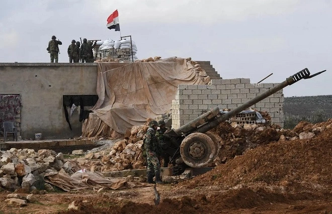 Binh sĩ Syria canh gác bên ngoài Aleppo. Ảnh: Sputnik