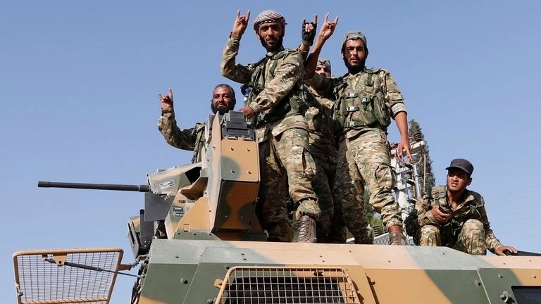 Các thành viên của Quân đội Quốc gia Syria. Ảnh: Reuters