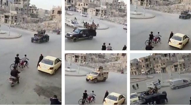 Reuters cũng xác nhận các lá cờ xuất hiện trong video thuộc về Lực lượng Dân chủ Syria (SDF).