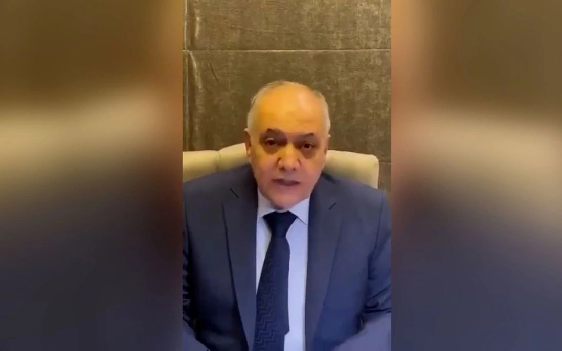 Thủ tướng Syria - Jalili xuất hiện trong 1 video tuyên bố sẵn sàng chuyển giao quyền lực. Ảnh: CNN.