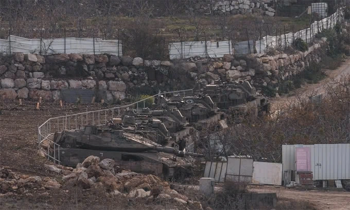 Xe tăng Israel tại vị trí trên Cao nguyên Golan ngày 8/12. Ảnh: IDF
