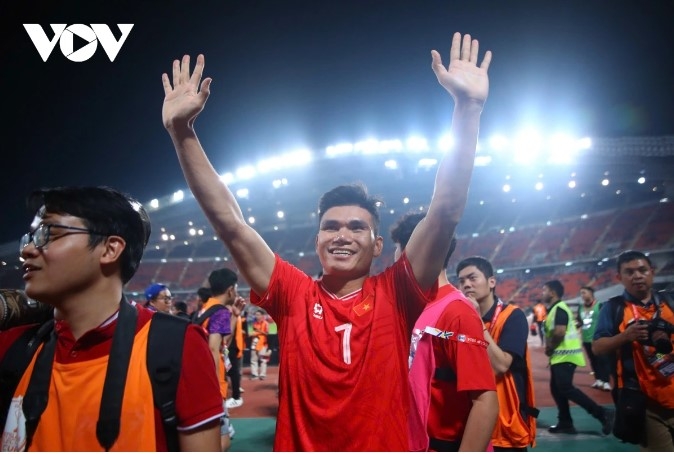 After the final whistle blows, the Vietnamese players erupt in joy at their victory