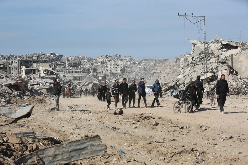 Người dân trở về nhà ở phía bắc dải Gaza, sau khi lệnh ngừng bắn giữa Israel và Phong trào Hồi giáo Hamas có hiệu lực. Ảnh minh họa: THX/TTXVN