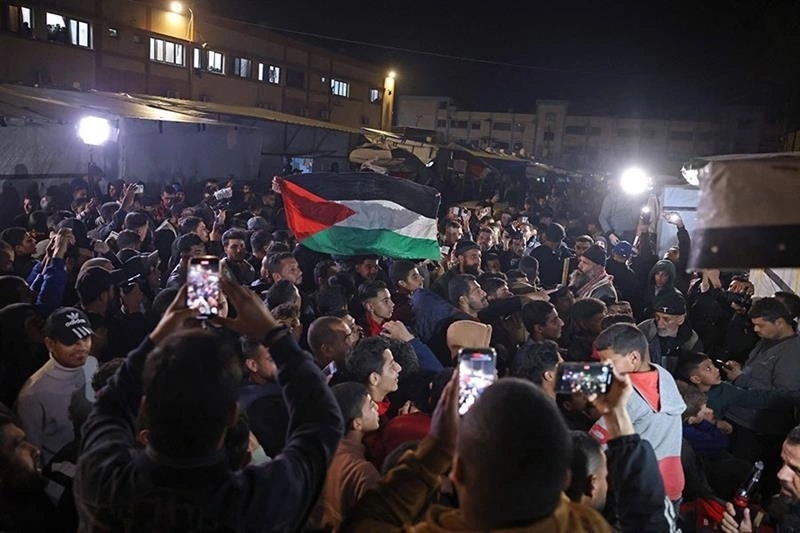 Người dân Gaza vui mừng khi đạt được thỏa thuận ngừng bắn giữa Israel và Hamas. (Ảnh: AFP)