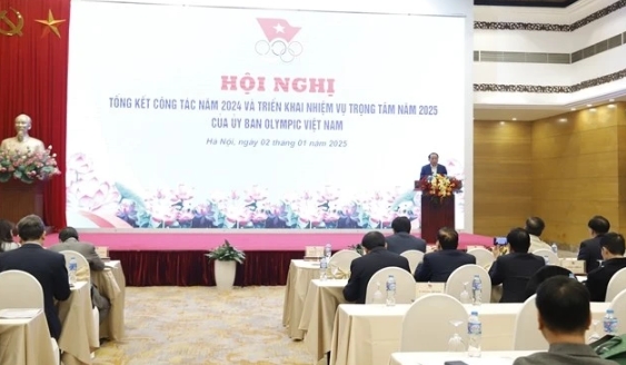 Minister of Culture, Sports and Tourism cum VOC President Nguyen Van Hung speaks at the conference on Vietnam's sport plans in 2025 on January 2 in Hanoi.