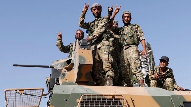 Các thành viên của Quân đội Quốc gia Syria. Ảnh: Reuters