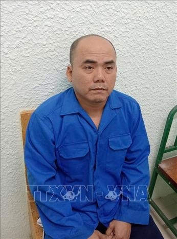 Lái xe Phạm Quốc Huy tại cơ quan cảnh sát điều tra. Ảnh: TTXVN phát
