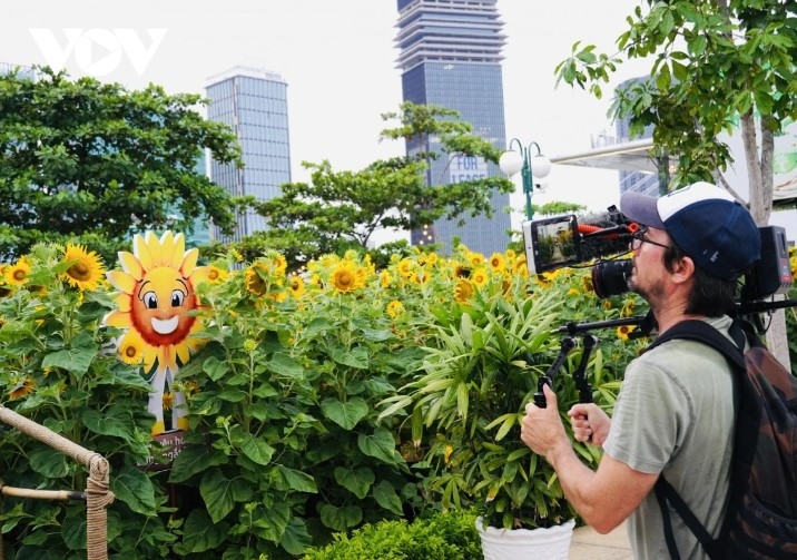 The best time to capture stunning photos in the sunflower field is at sunset.