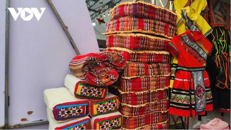 Meticulously crafted and colorful pillows, scarves, and seat cushions are introduced to visitors.