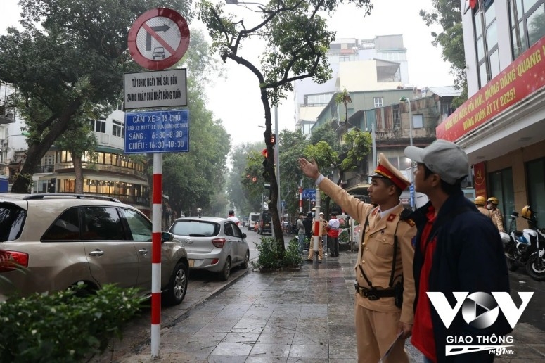Traffic in Hanoi’s Old Quarter eases on the first day of the restriction. The ban on large passenger vehicles reduces congestion.