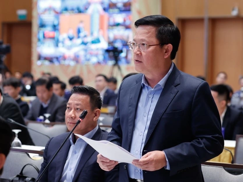 Thứ trưởng Bộ Tư pháp Mai Lương Khôi trình bày về ứng dụng trí tuệ nhân tạo trong rà soát, xây dựng văn bản quy phạm pháp luật - Ảnh: VGP/Nhật Bắc