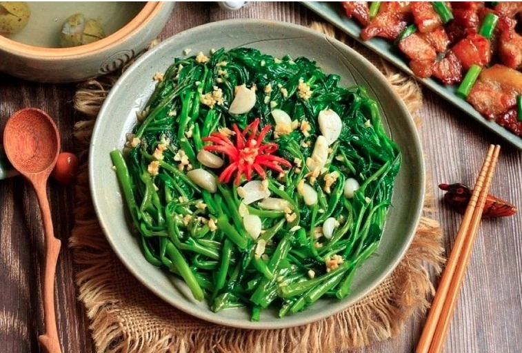 Rau muống xào tỏi is named among the world’s Top 100 vegetable dishes by TasteAtlas (Photo: Istock)