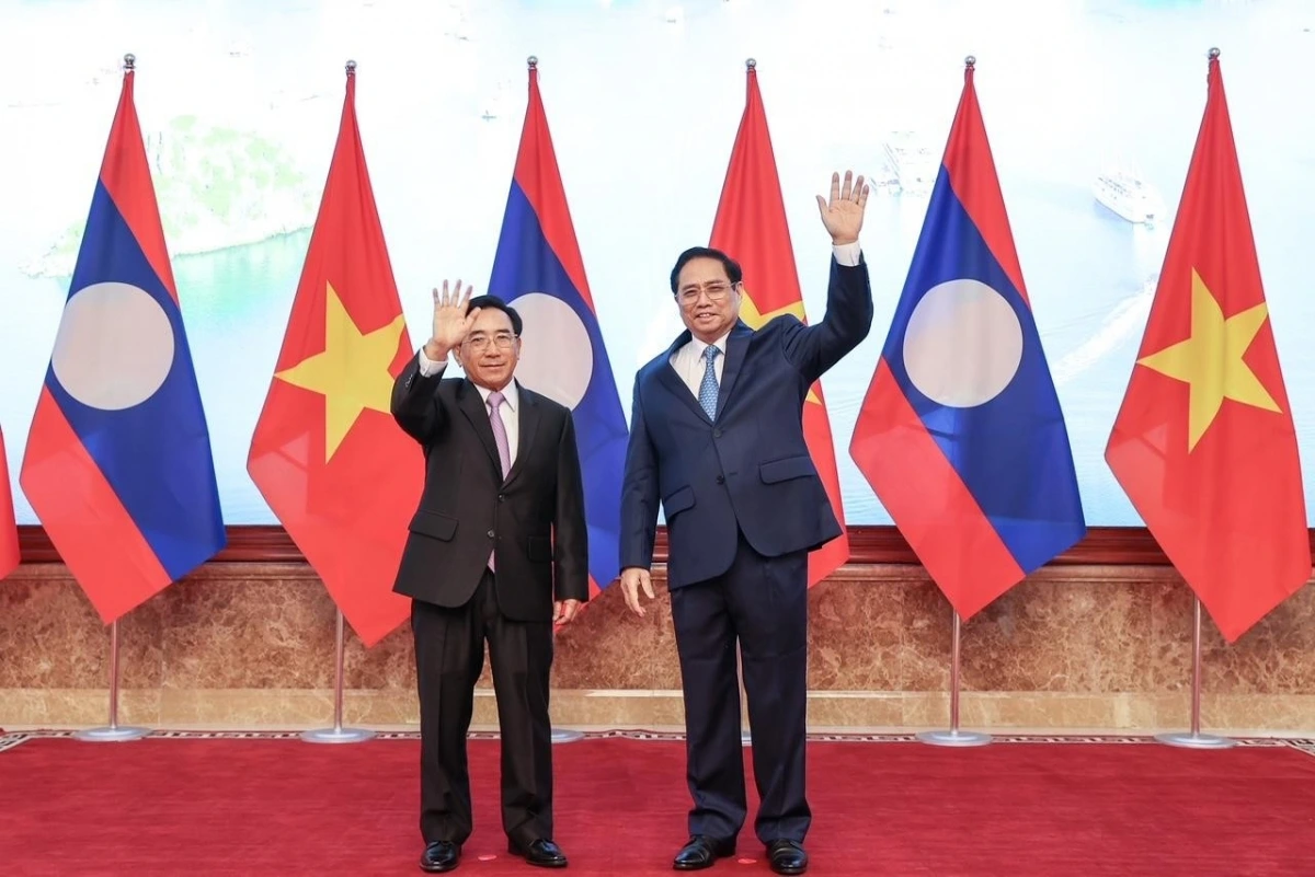 Thủ tướng Phạm Minh Chính và Thủ tướng Lào Phankham Viphavanh. Ảnh: VGP/Nhật Bắc