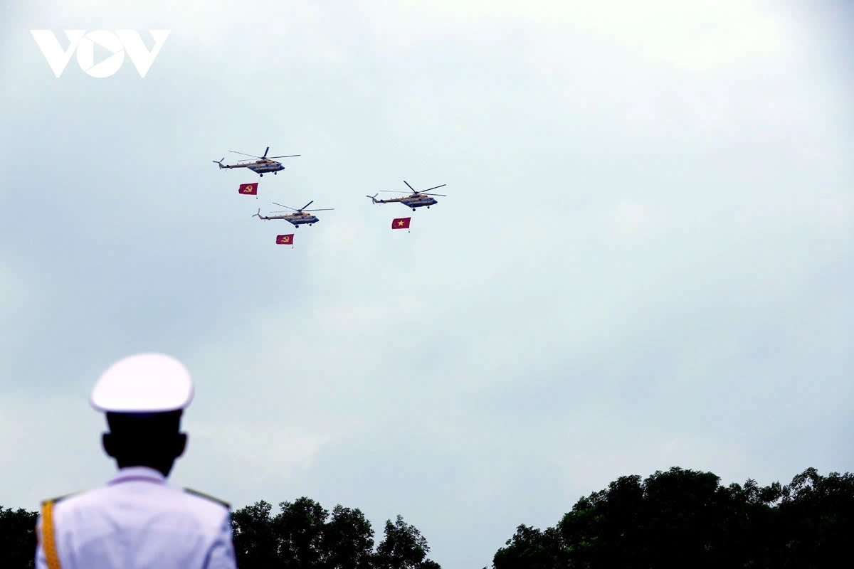 The Air Force’s welcome flyover opens the military parade rehearsal.