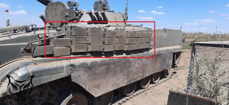 Xe tăng Nga trang bị giáp phản ứng không nổ mới (NERA) được bổ sung cát hoặc xi măng. Ảnh: X