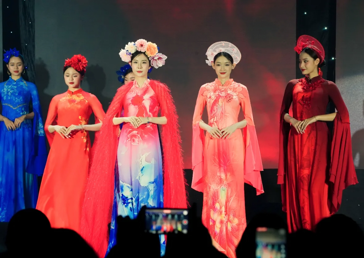 Ao Dai designs are modeled by beauty queens, singers, and students from the Vietnam Women's Academy (VWA).