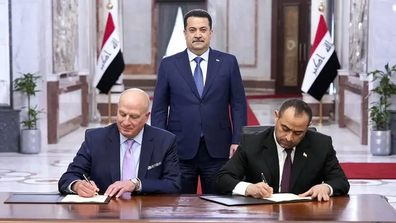 Thủ tướng Iraq Mohammed Shia Al-Sudani chứng kiến lễ ký kết Bản ghi nhớ. (Ảnh: AFP)