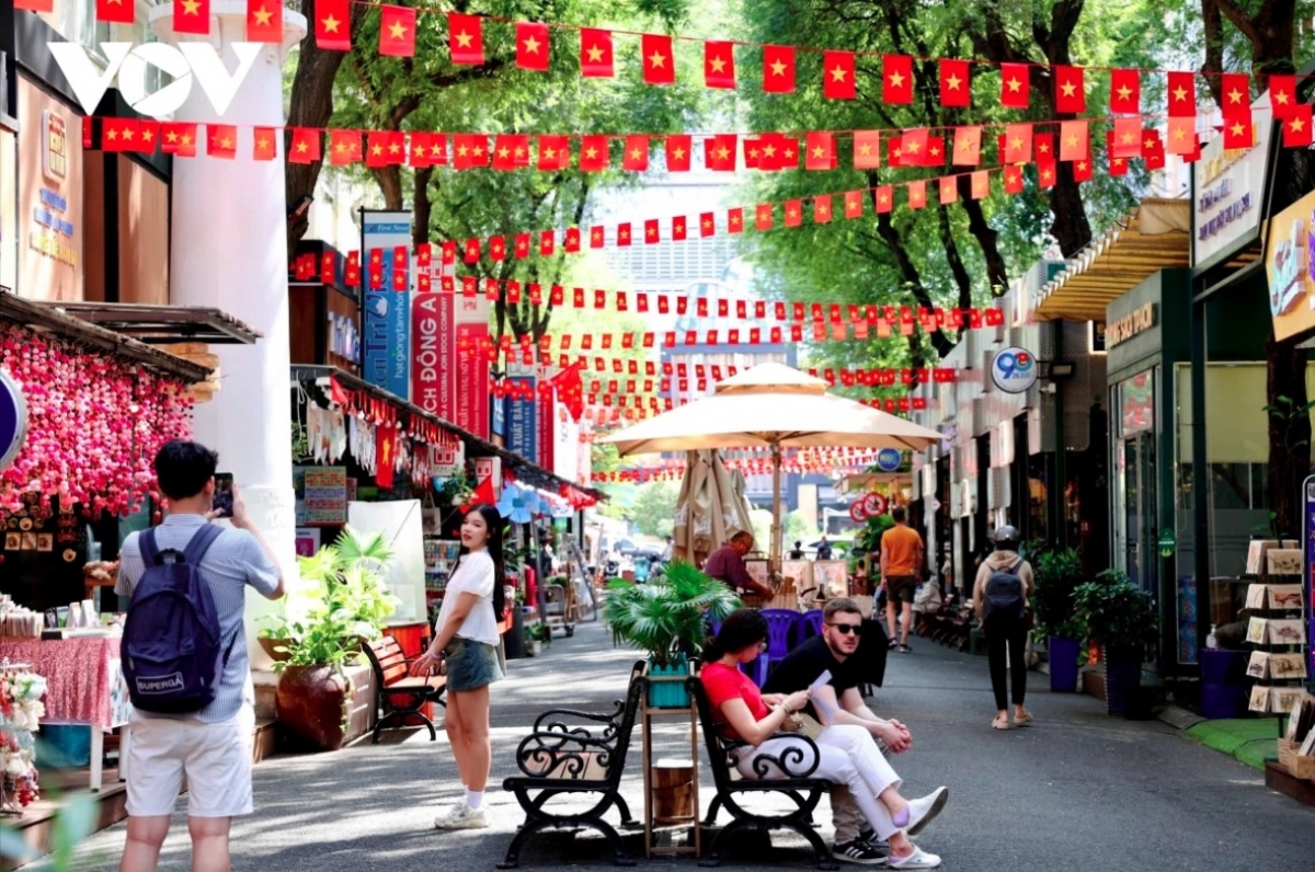 Ho Chi Minh City Book Street in District 1 is adorned with vibrant flags and flowers.
