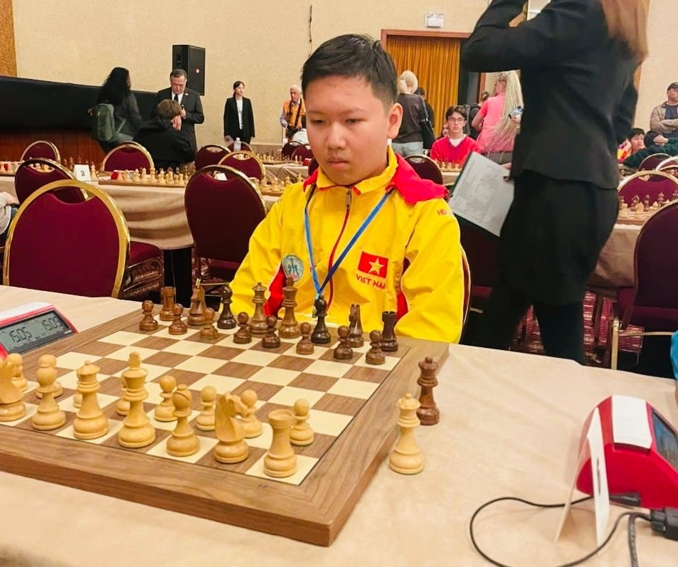 Nguyen Nam Kiet wins U14 world youth rapid chess title. (Photo: sggp.org.vn)