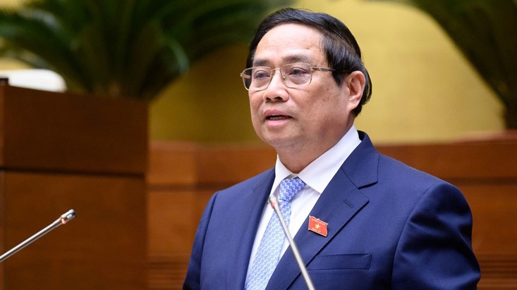 Thủ tướng Phạm Minh Chính báo cáo kết quả thực hiện kế hoạch KT-XH trước Quốc hội tại Kỳ họp thứ 9. Ảnh: Quốc hội